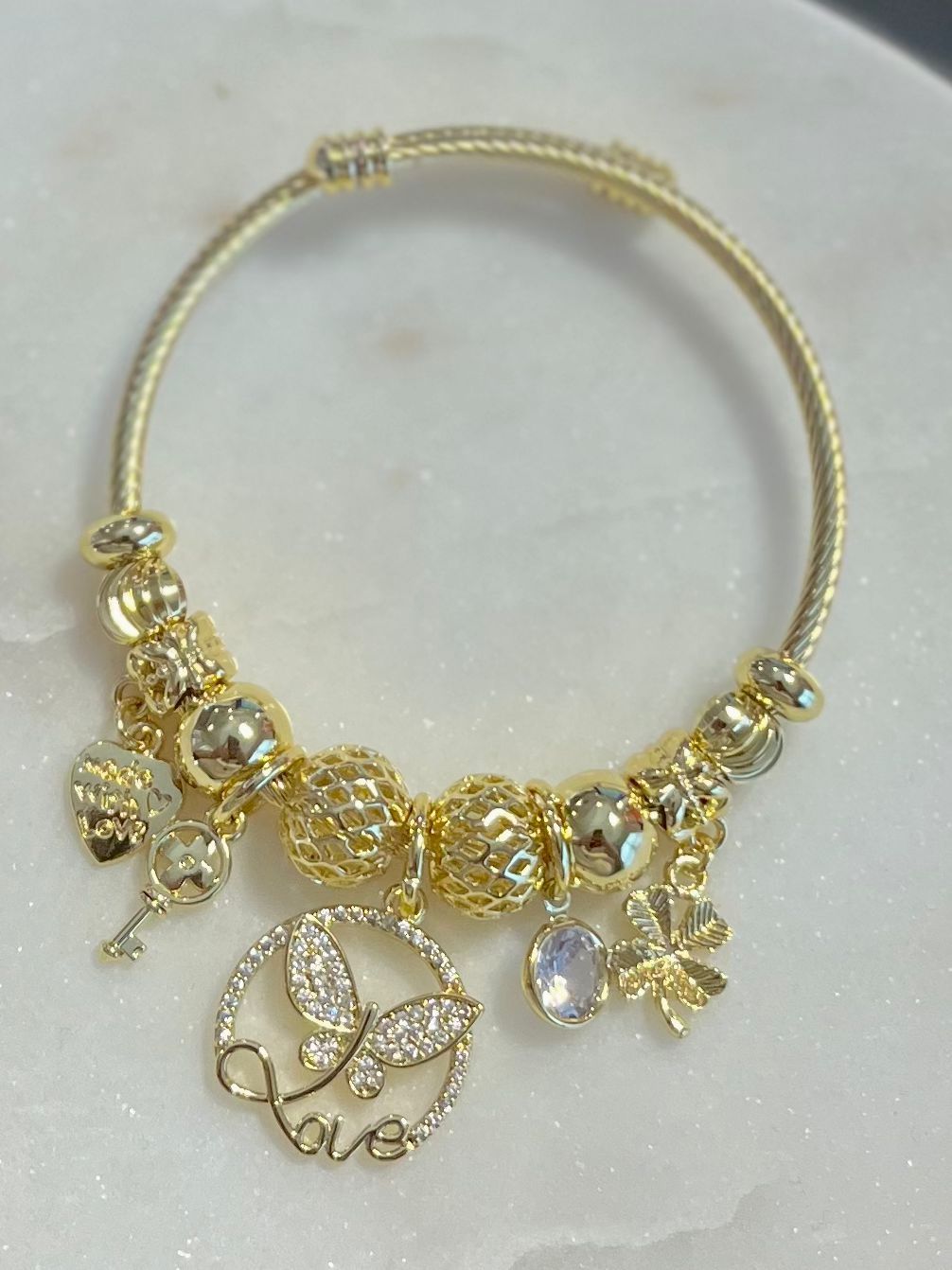 Pulsera Dorada Charms