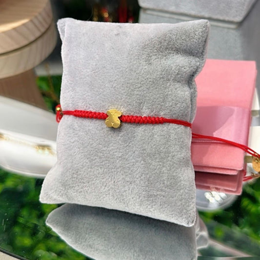Pulsera tejida Osito