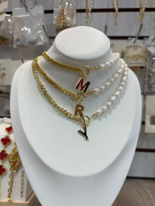 Iniciales Perla Dorado